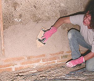 application de l'enduit de fond